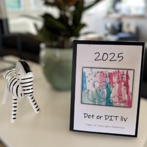 Kalender 2025 i sort ramme med afrundede kanter