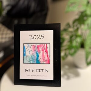 Kalender 2025 i sort ramme