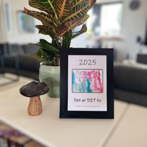 Kalender 2025 i sort ramme